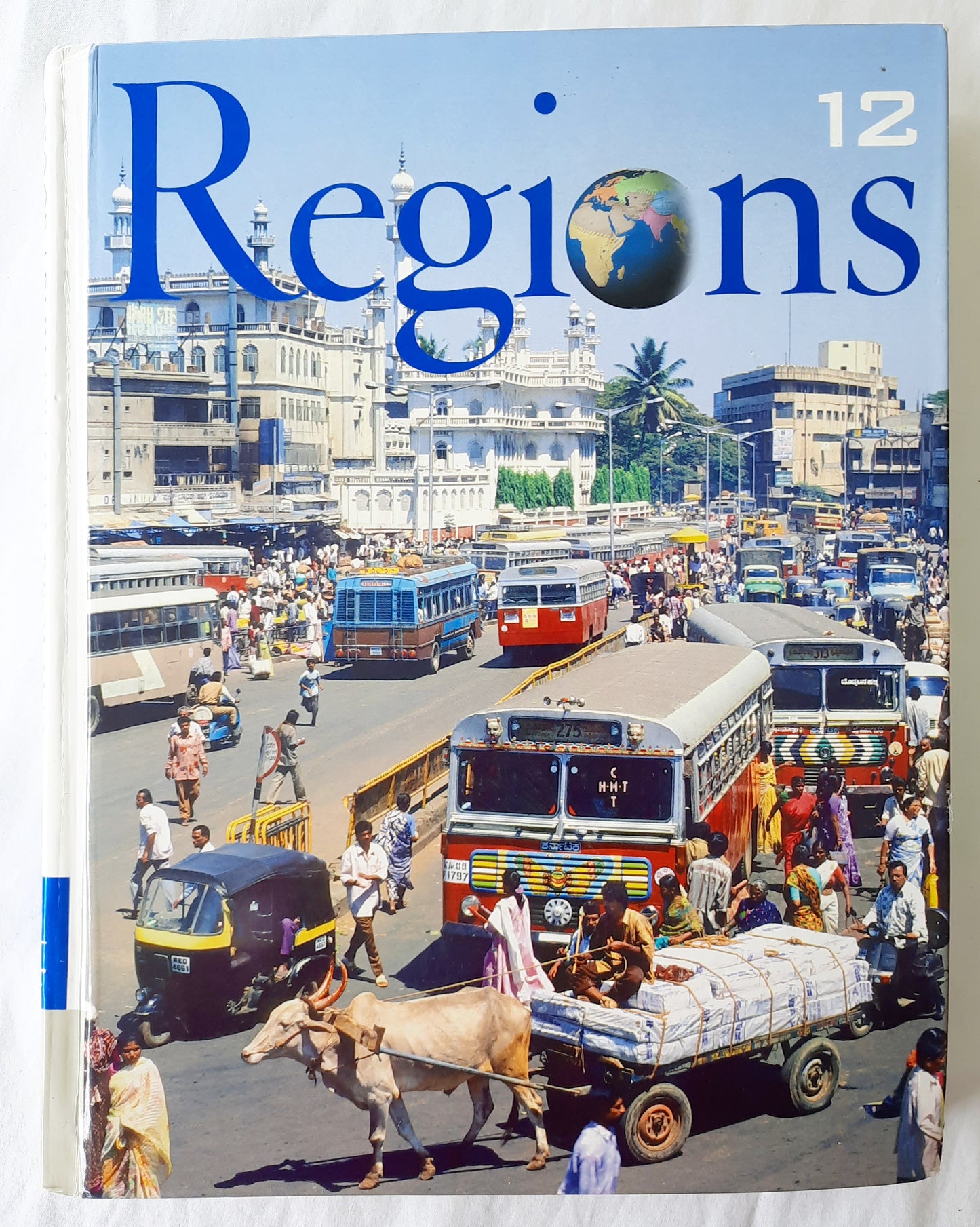 Regions Geography: Realms, Regions, and Concepts 12th Edition by H.J. de Blij; Peter O. Muller (Very good, 2006, HC, 652 pages, JOhn Wiley & Sons)