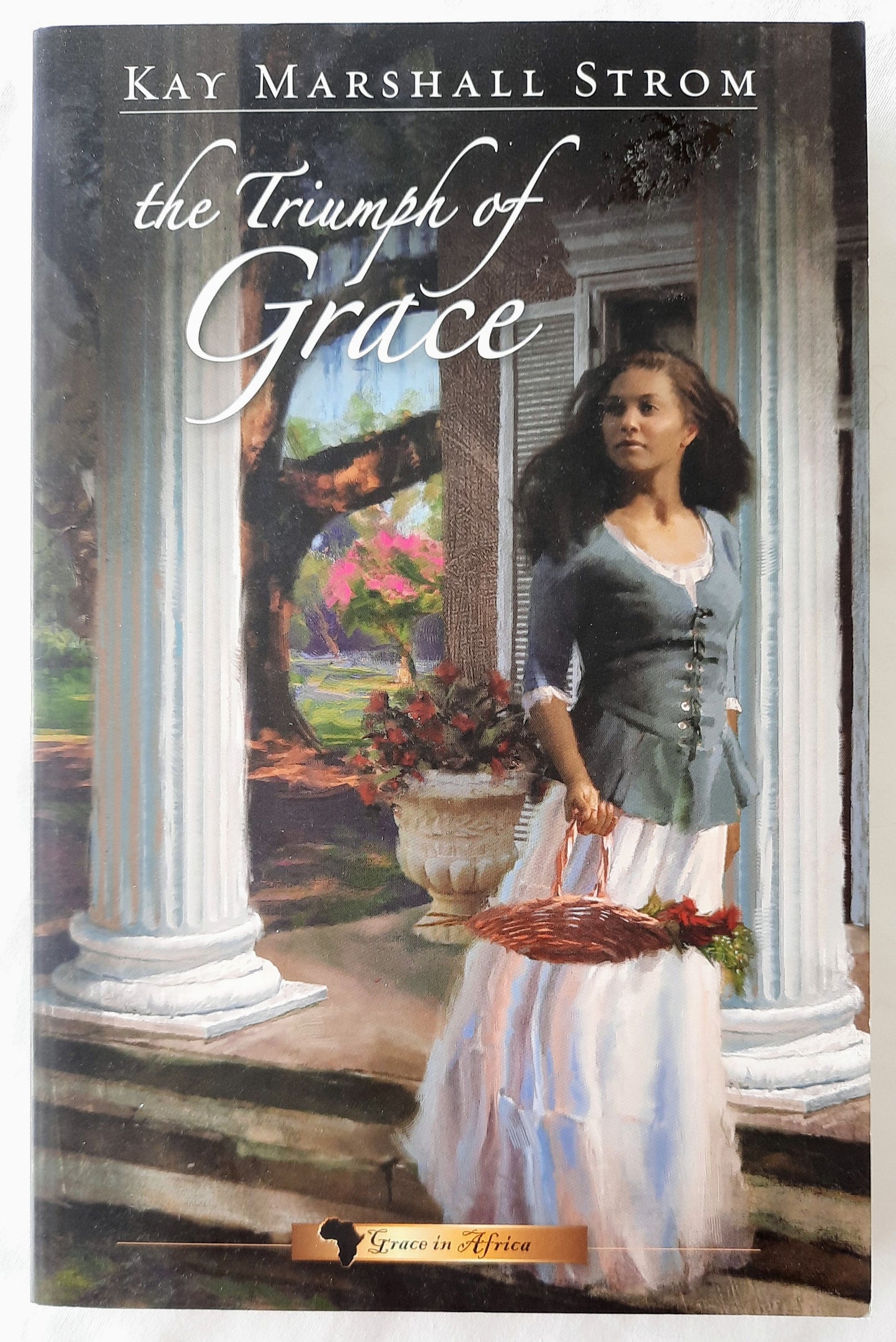 The Triumph of Grace #3 by Kay Marshall Strom (Grace in Africa series, Very good, 2011, Pbk, 320 pages, Abingdon Press)