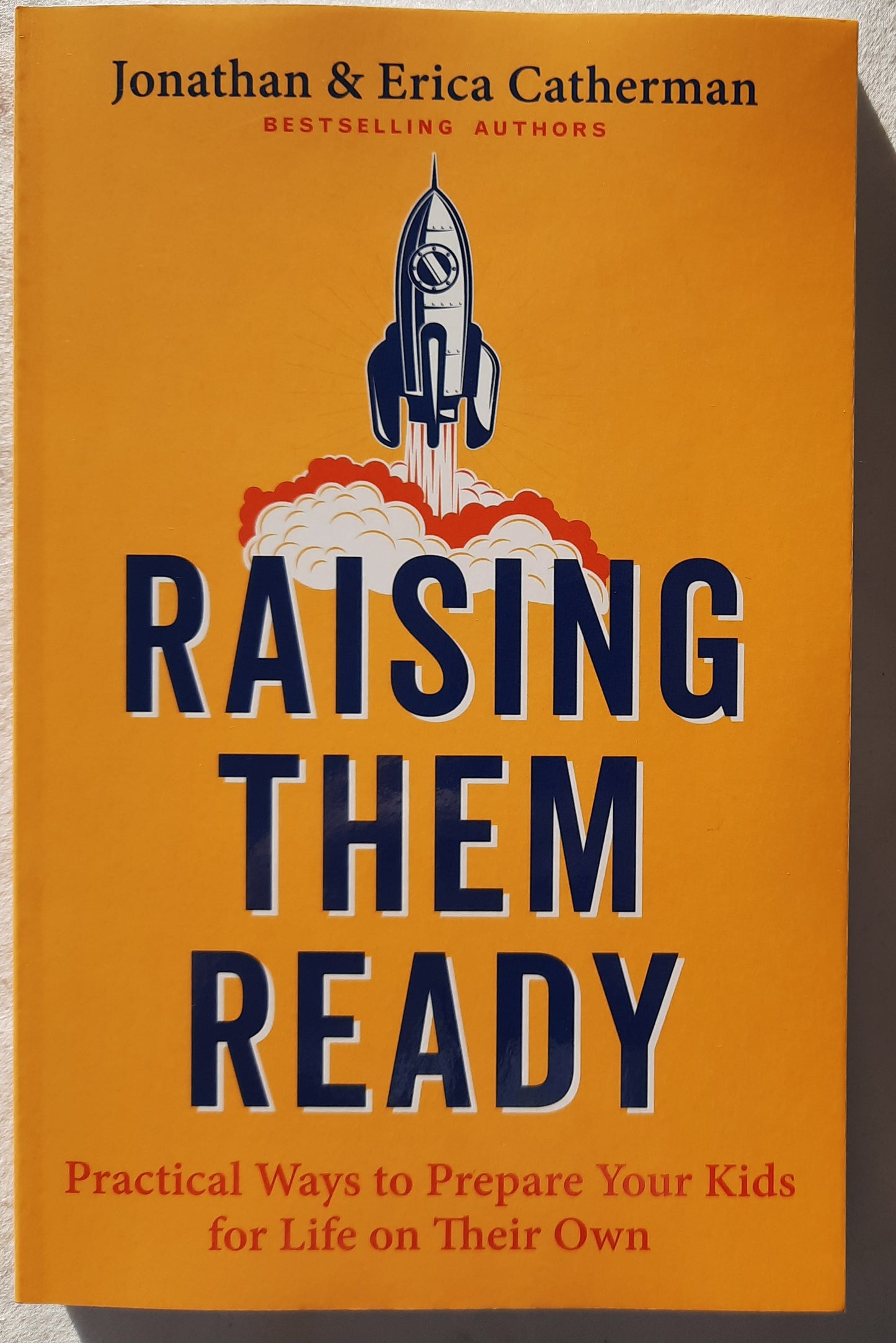 Raising Them Ready: Practical Ways to Prepare Your Kids for Life on Their Own by Jonathan & Erica Catherman (New, 2022, Pbk, Revell, 215 pages)