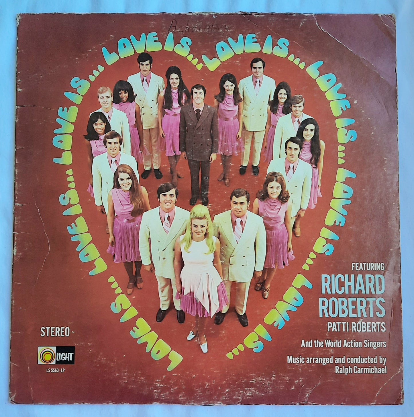 Love Is...Featuring Richard Roberts; Patti Roberts and World Action Singers Christian Vinyl LP Album (Very good, LS 5563, Light Records)Light Records
