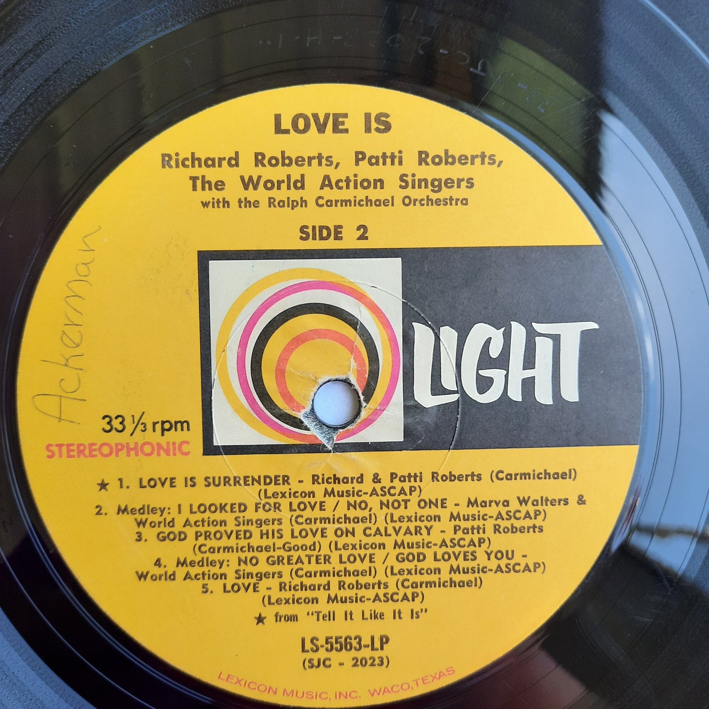 Love Is...Featuring Richard Roberts; Patti Roberts and World Action Singers Christian Vinyl LP Album (Very good, LS 5563, Light Records)Light Records