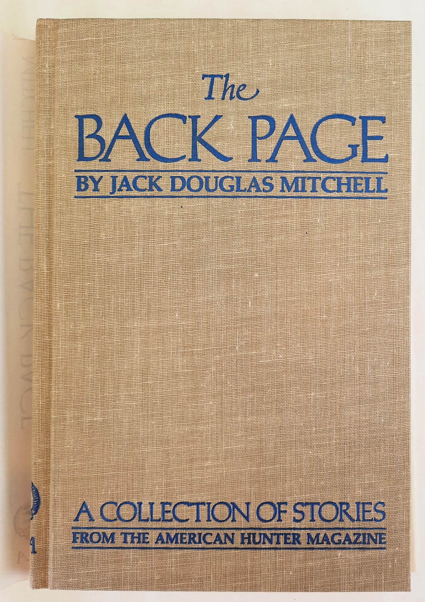 The Back Page: A Collection of Stories by Jack Douglas Mitchell (Very Good, 1982, HC, 133 pages, National Rifle Association)
