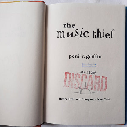 The Music Thief by Peni R. Griffin (Good, 2002, HC, 154 pgs, Henry Holt & Co.)