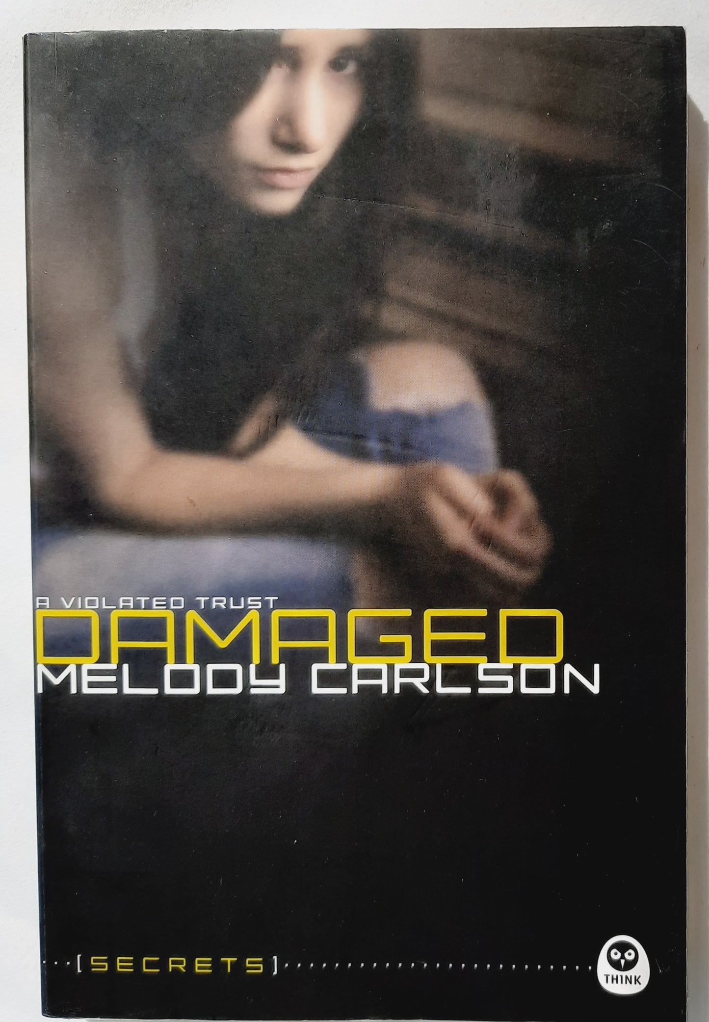 Damaged: A Violated Trust by Melody Carlson (Secrets, Very good, 2011, Pbk, 205 pages, NavPress)