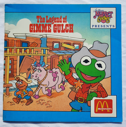McDonalds's: Muppet Babies Presents The Legend of Gimme Gulch by Ellen Weiss; Donna Reynolds (Very good, 1988, PBK, Muppet Press)