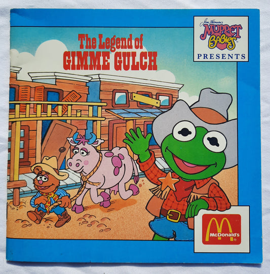 McDonalds's: Muppet Babies Presents The Legend of Gimme Gulch by Ellen Weiss; Donna Reynolds (Very good, 1988, PBK, Muppet Press)