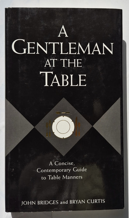 A Gentleman at the Table: A Concise, Contemporary Guide to Table Manners by John Bridges; Bryan Curtis (Very good, 2004, HC, 200 pages, Rutledge Hill Press)