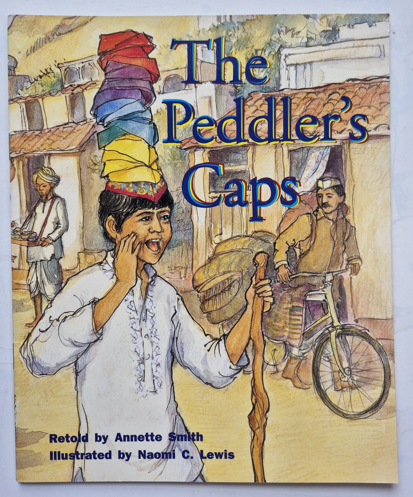 The Peddler's Caps by Annette Smith; Naomi Lewis (Very good, 2002, Pbk, 16 pgs, Rigby PM Coll.)