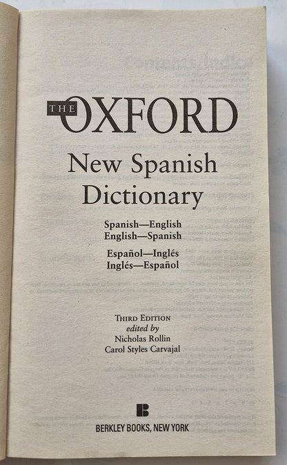 The Oxford New Spanish Dictionary edited by Nicholas Rollin; Carol Carvajal (Very good, 2009, PBK, 477 pgs, Berkley Pub)