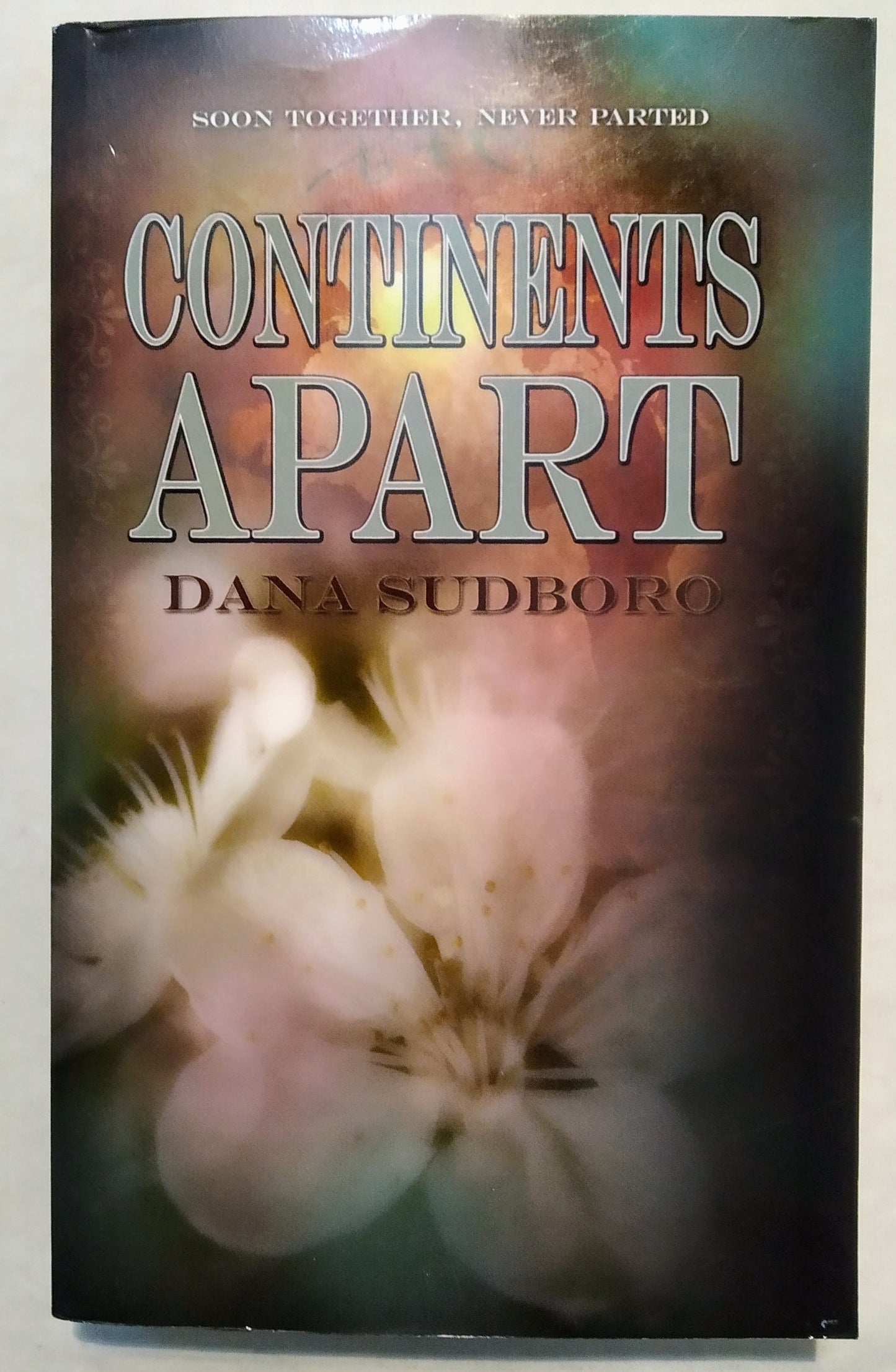 Continents Apart by Dana Sudboro (New, Pbk, 2010, White Rose, 347 pgs)