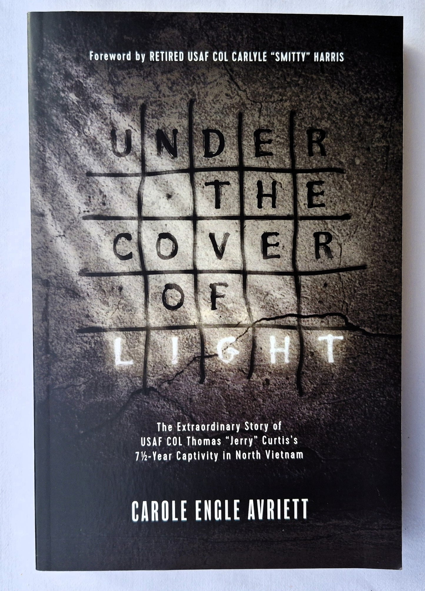 Under the Cover of Light: The Extraordinary Story of USAF COL Thomas Curtis's 7 1/2 Year Captivity in North Vietnam by Carole Engle Avriett (New, 2017, HC, 320 pgs, Tyndale Momentum)