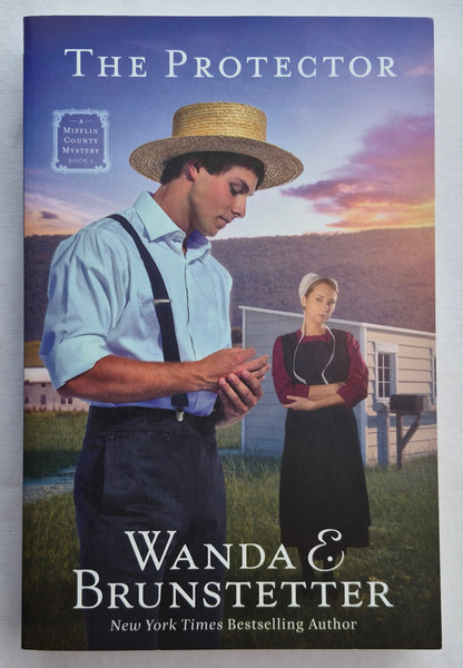 The Protector von Wanda E. Brunstetter (Mifflin County Mystery #1, Neu, 2024, Taschenbuch, 317 Seiten, Barbour Publishing)