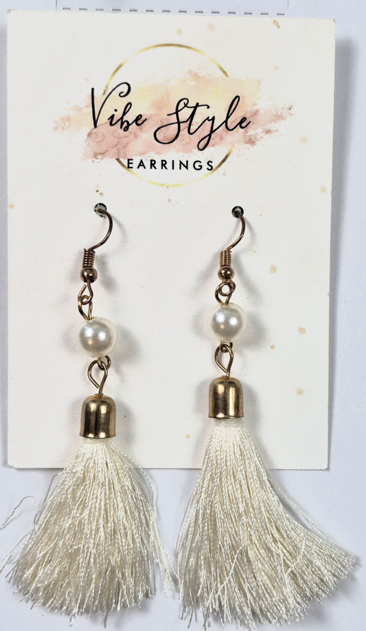 Earrings by Vibe Style white fringe with faux pearls in gold tone base (Brand New)
