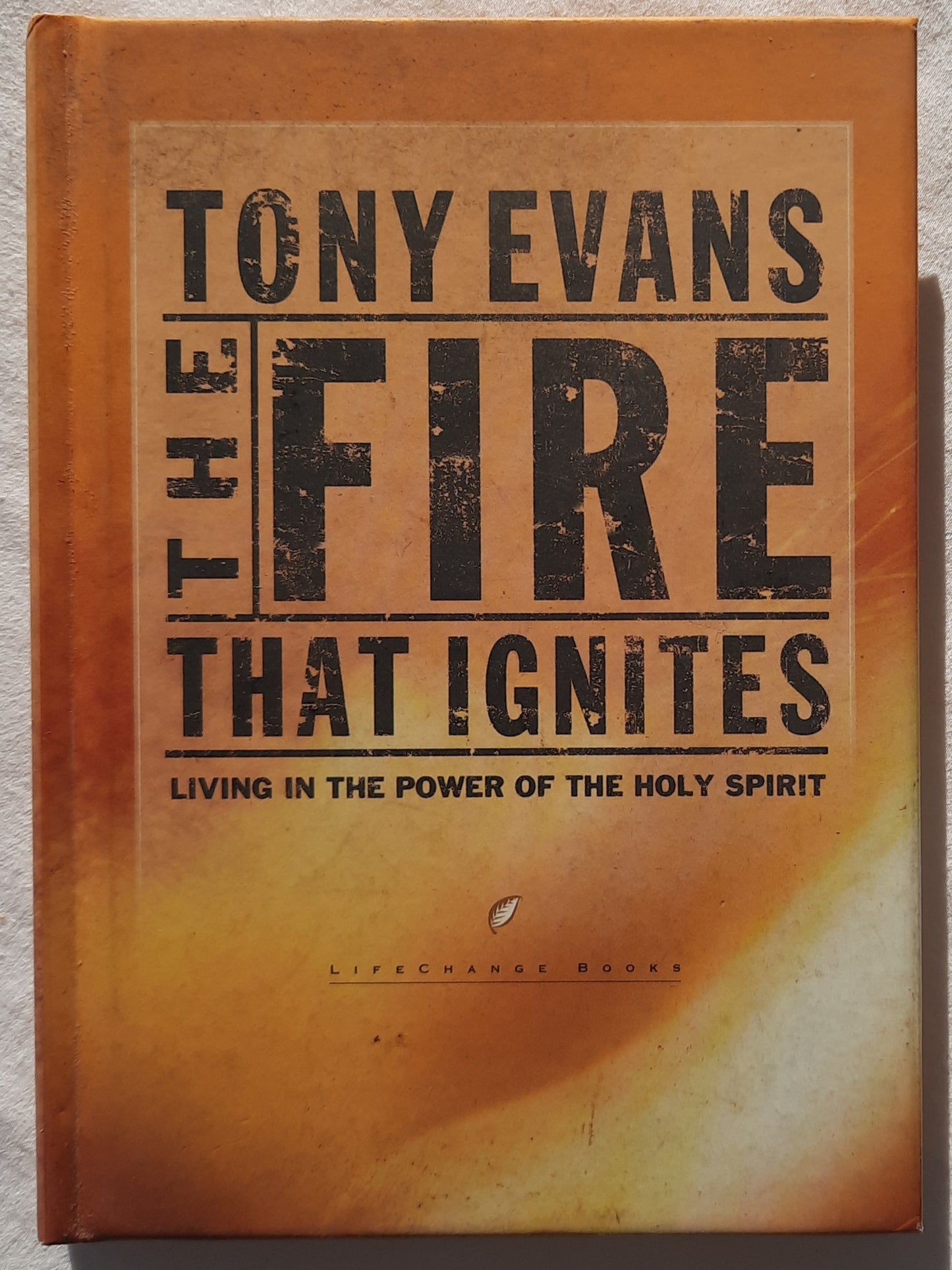 The Fire That Ignites: Living in the Power of the Holy Spirit by Tony Evans (Good, 2003, HC, 95 pages, Multnomah)