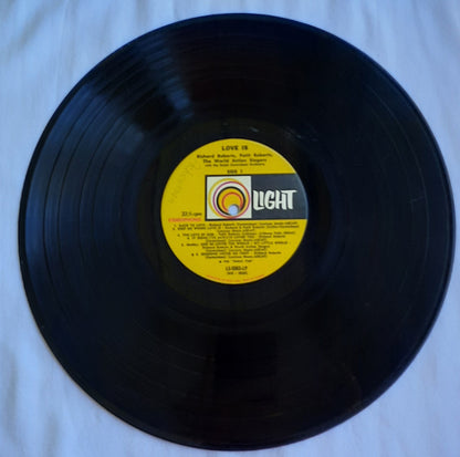 Love Is...Featuring Richard Roberts; Patti Roberts and World Action Singers Christian Vinyl LP Album (Very good, LS 5563, Light Records)Light Records