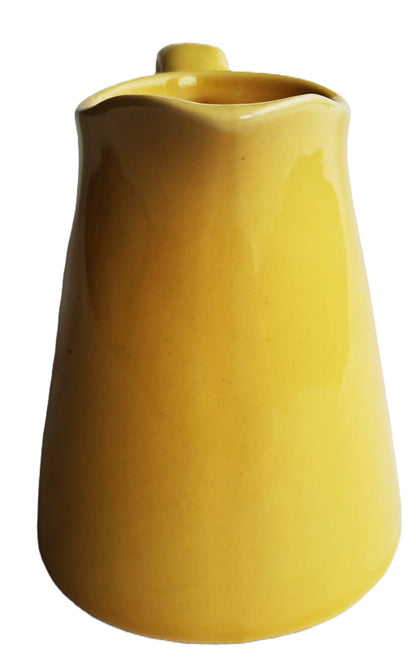 Coffee or Tea Creamer by USA Pottery (Yellow Mid-century modern, very good condition, 4.25" H)