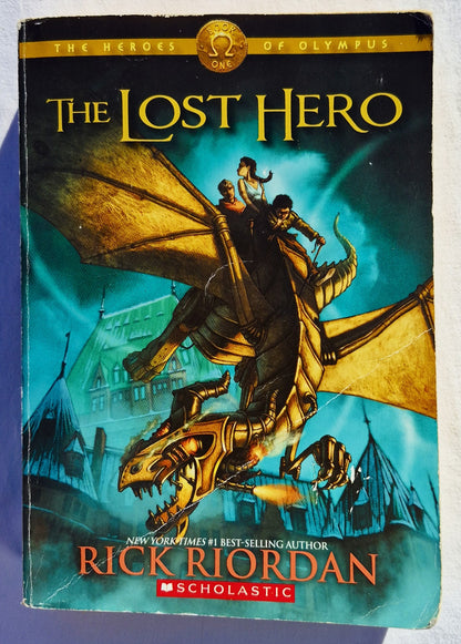 The Lost Hero by Rick Riordan (The Heroes of Olympus #1, Good, 2012, Pbk, 557 pages, Scholastic)