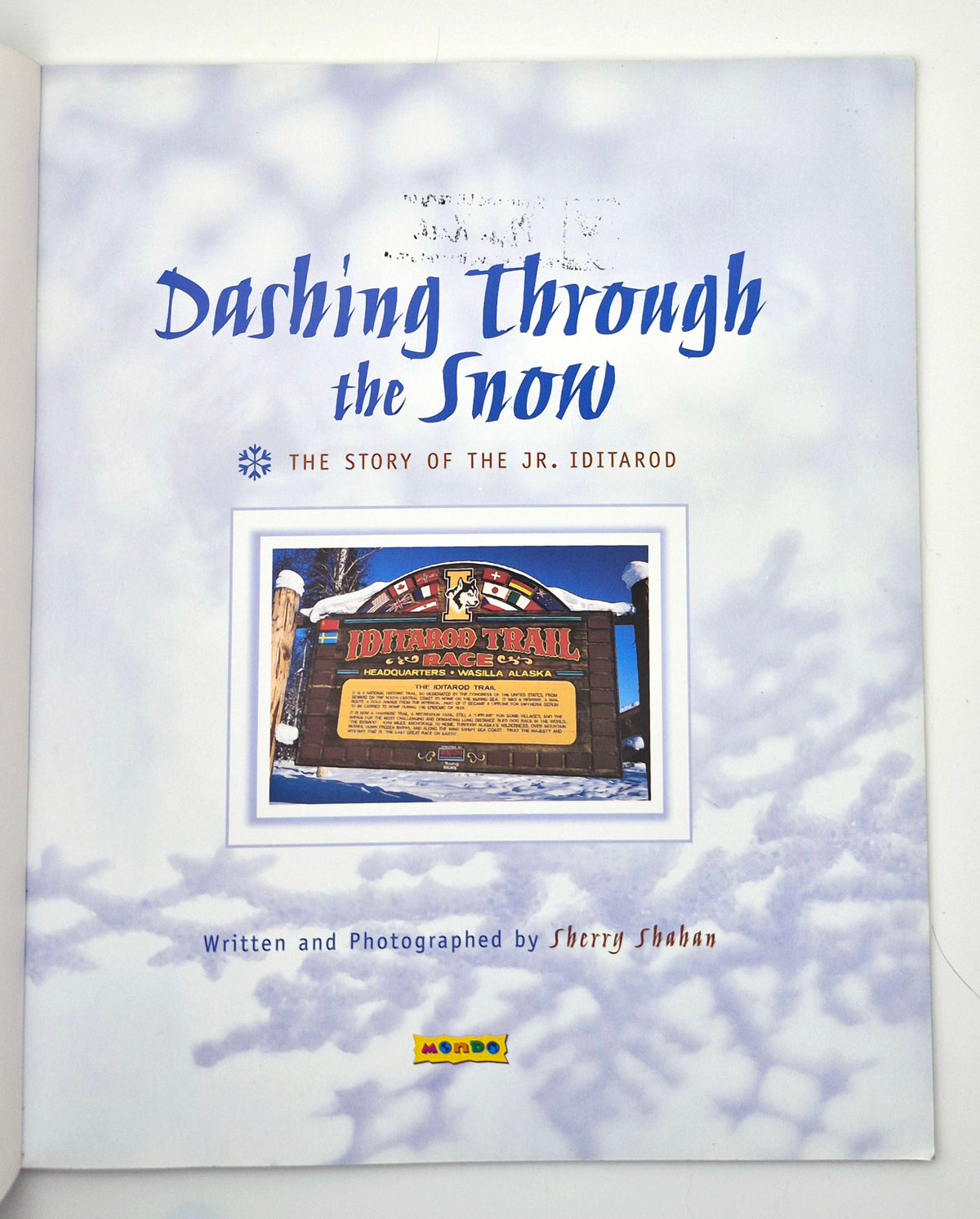 Dashing Through the Snow: The Story of the Jr. Iditarod by Sherry Shahan (Very Good, 2007, Pbk, 32 pgs, Book Shop Level R)