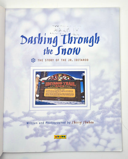 Dashing Through the Snow: The Story of the Jr. Iditarod by Sherry Shahan (Very Good, 2007, Pbk, 32 pgs, Book Shop Level R)