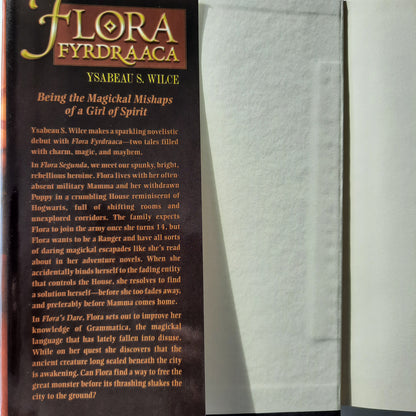 Flora Fyrdraaca: Flora Sedunga & Flora's Dare by Ysabeau S. Wilce (Very Good, 2009, HC, 691 pgs)